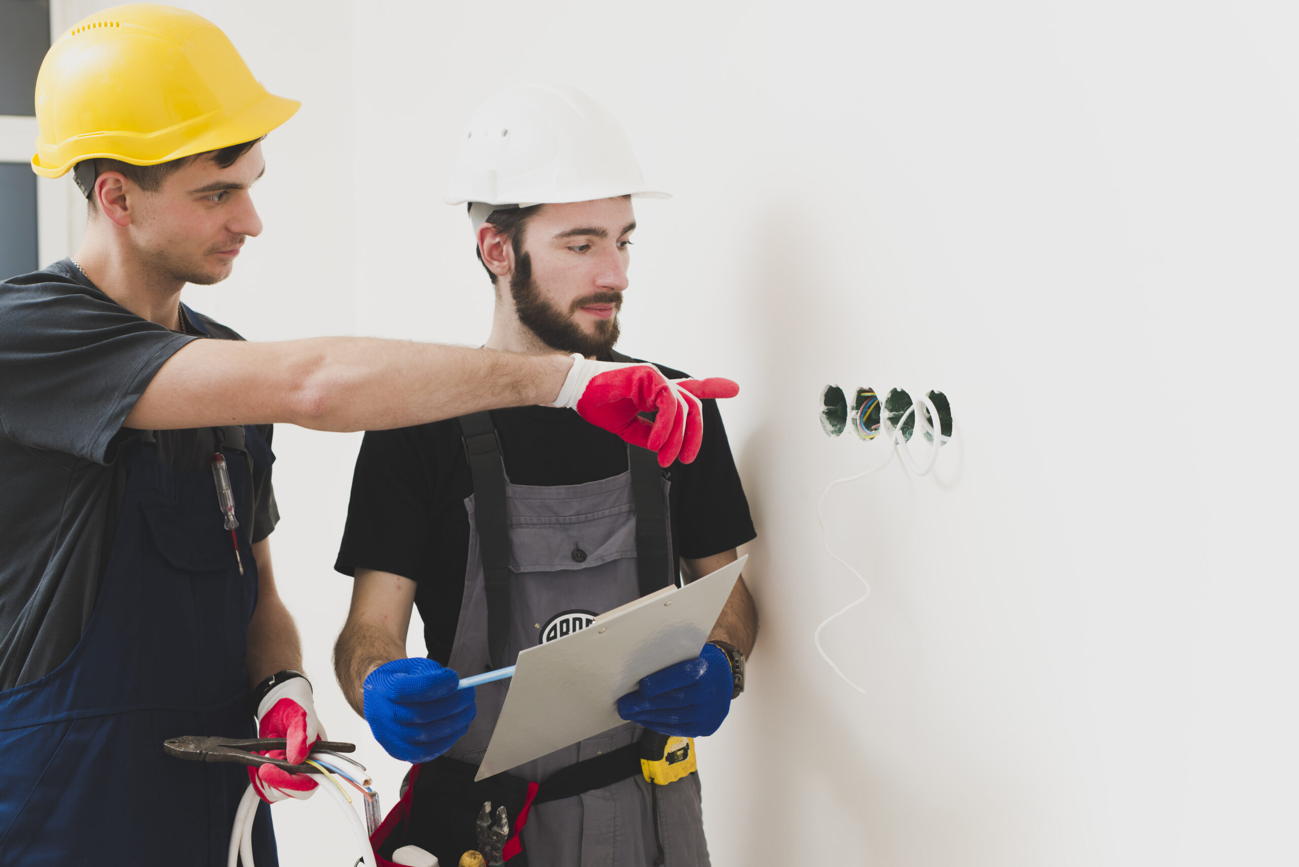 handymen-collaborating-plug-holes