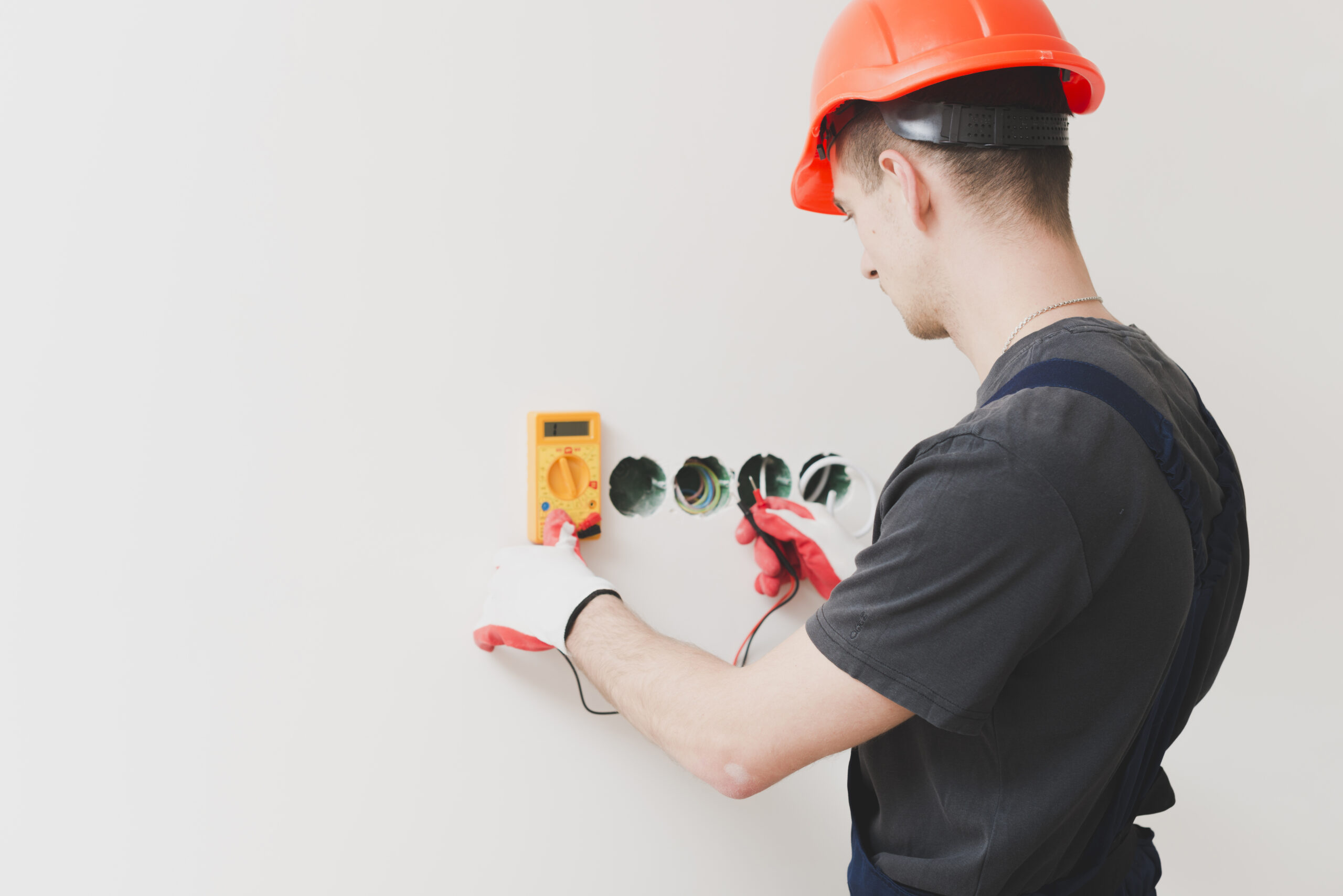 man-making-cable-voltage-measure